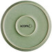 A round, sage green plate with a matte finish and the word 'ACOPA' printed in black on the bottom center.