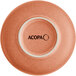 The image shows the underside of a round, terra cotta-colored bowl with a matte, speckled finish and the word 'ACOPA' printed in the center.