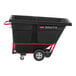 A black Rubbermaid Brute tilt truck with red wheels.
