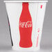 A white Solo paper cold cup with a red Coca Cola bottle logo.