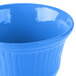 A cobalt blue cast aluminum bowl with a white background.