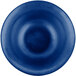 A cobalt blue cast aluminum bowl with a circular center and tulip design.