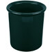 A hunter green cast aluminum container with a handle.