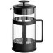 A glass and black French press coffee maker with a handle and plunger.