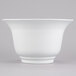 A white Tablecraft cast aluminum tulip salad bowl with a curved rim.