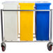 A Winholt mobile triple ingredient bin cart with three yellow rectangular ingredient bins on it.