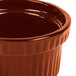 A close up of a Tablecraft copper cast aluminum bowl with ridges.