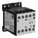 A black and gray electrical contactor with multiple labeled connection terminals and a side label displaying technical specifications.