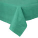 A hunter green tablecloth with a pattern on it.