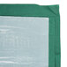 A package of 6 green and white plastic table covers.