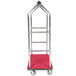 A stainless steel Aarco luggage cart with red fabric on top.