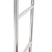 A stainless steel luggage cart with a chrome metal frame and clothing rail.
