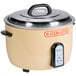 A close-up of a Town commercial rice cooker with a lid and handle.