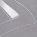 A close-up of a clear plastic Fineline Wavetrends square plate.