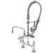 A T&S chrome pre-rinse faucet with hose and sprayer.