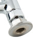 A chrome deck mount pet grooming faucet with a metal handle and shower head.