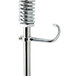 A close-up of a T&S stainless steel pet grooming faucet with metal hook.