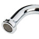 A T&S wall mount pet grooming faucet with a coiled hose and aluminum spray nozzle.