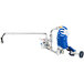 A T&S wall mount pet grooming faucet with a blue coiled hose and aluminum spray valve.