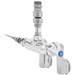 A silver T&S wall mount pet grooming faucet with a blue knob.