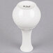 A close-up of a CAC white porcelain bud vase with a round base.