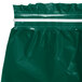A Hunter Green plastic table skirt with a white strip.