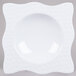 A white square melamine bowl with a wavy edge.