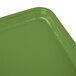 A close up of a rectangular lime-ade green Cambro tray.