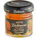 A case of 72 Dickinson's Pure Fancy Sweet Orange Marmalade jars with black lids.