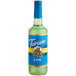A Torani Sugar-Free Lime Syrup 750 mL glass bottle with a blue label.