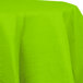 Creative Converting 923123 82" Fresh Lime Green OctyRound Tissue / Poly Table Cover - 12/Case Main Thumbnail 2