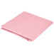 A pink Creative Converting OctyRound table cover folded on a white background.