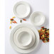 Tuxton YED-063 Monterey 6.5 oz. Eggshell Embossed Rim China Grapefruit Bowl / Dish - 36/Case Main Thumbnail 5