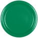A close-up of a green Creative Converting paper plate with a white border.