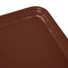 A close up of a brown Cambro rectangular fiberglass tray.