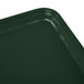 A close up of a Cambro rectangular Sherwood green fiberglass tray.