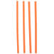 A group of orange plastic twist ties on a white background.