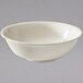A white melamine bowl with a speckled rim.