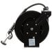 A black Equip by T&S metal hose reel with a hose attached.