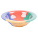 A colorful bowl with a multicolored diamond design on a white background.