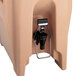 A beige plastic Cambro Easy Serve Dispenser Attachment with a metal clip.