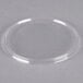 A clear plastic Dart lid on a white surface.