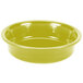 A yellow Fiesta china bowl on a white background.