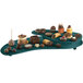 A Tablecraft hunter green cast aluminum two tiered platter with a tray of chocolate desserts on it.