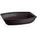 A black speckled rectangular dish with a handle.