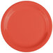 A close-up of a red GET Diamond Mardi Gras melamine plate.