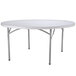 A Flash Furniture white round folding table with metal legs.