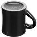 A black mug with a silver handle.