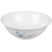 A white bowl with blue bamboo design on the rim.