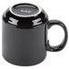 A black CAC Venice Stacking Mug with a silver rim on a counter.